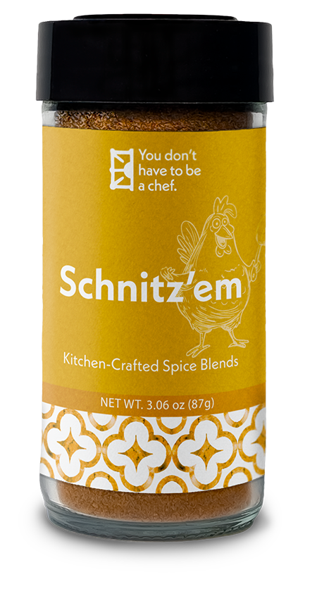 A bottle of Schnitz'em Mediterranean spice blend. 9 Middle Eastern spices for adding bold flavors to schnitzel, breaded chicken, or other fried dishes.